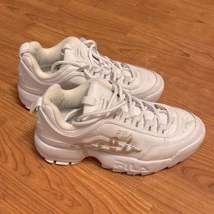 FILA white sneakers with metallic logo.